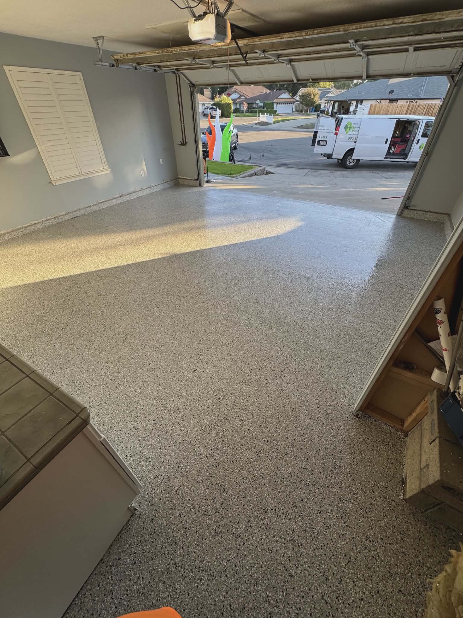 Standard epoxy floor coating in a residential two-car garage